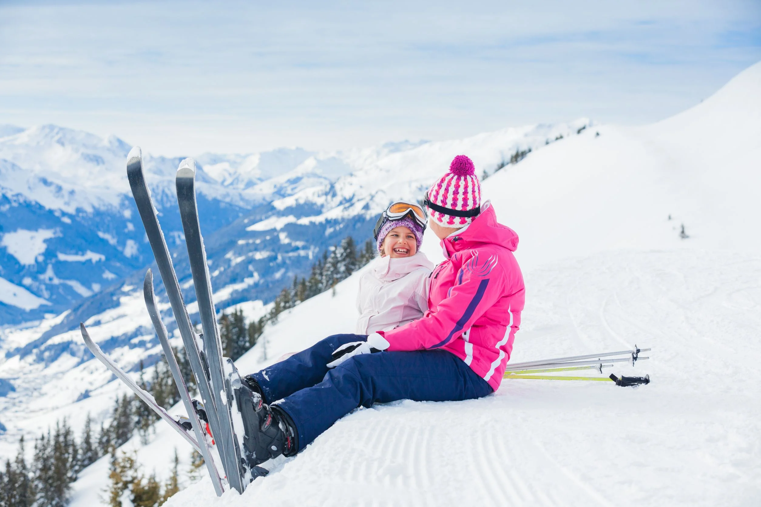 Family skiing together at Snowmass Village