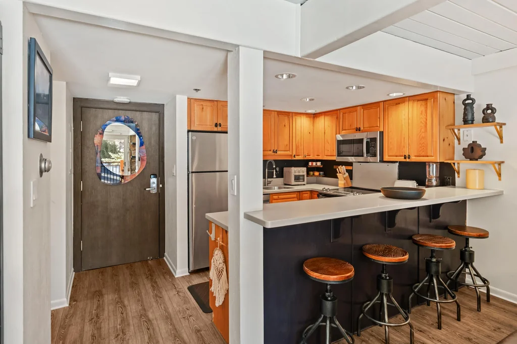 Stonebridge Condo 716 breakfast bar into the kitchen
